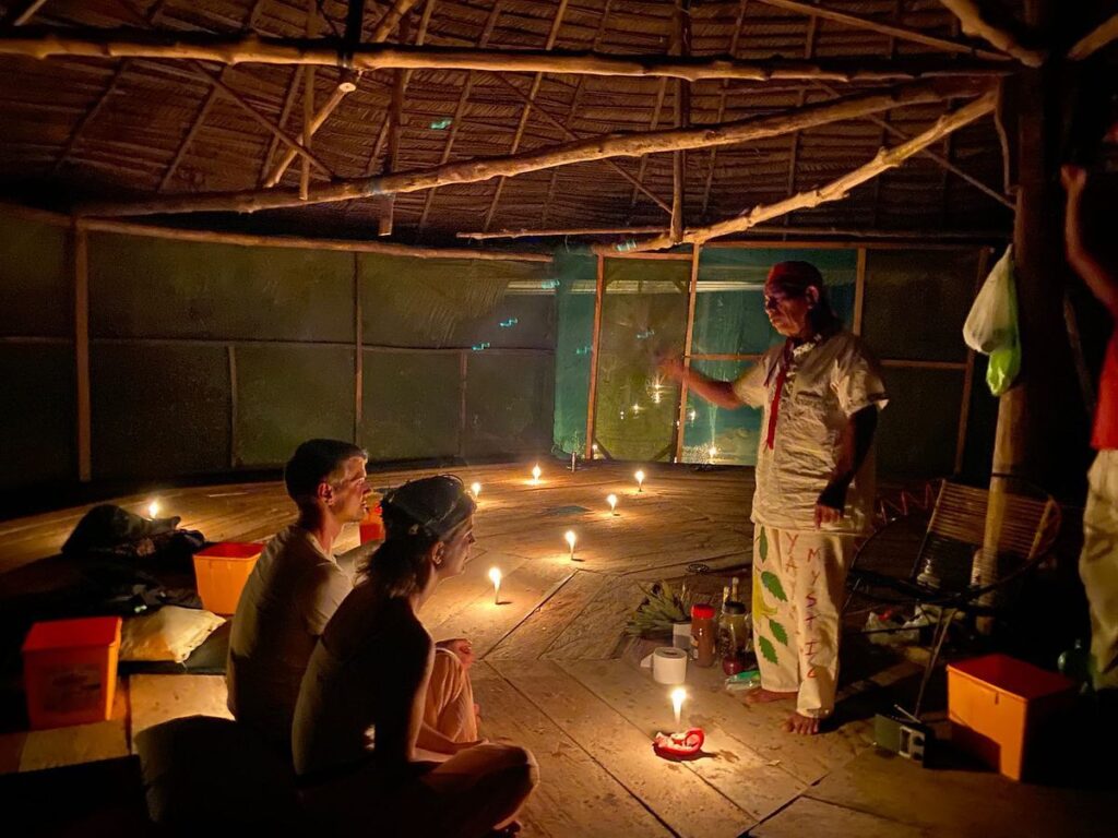 Amazonian ceremonial space prepared for ayahuasca work, reflecting silence, intention, and respect before the ceremony begins.