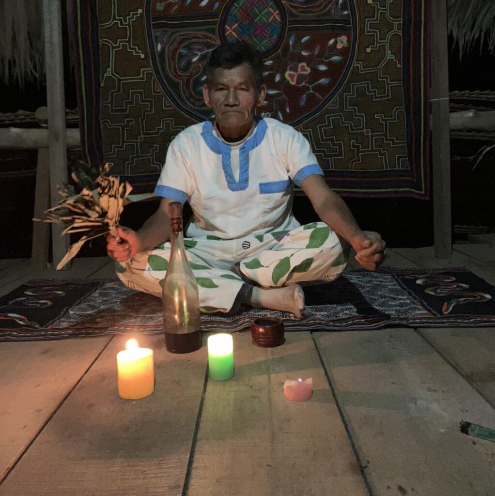Amazonian ceremonial setting with candlelight, reflecting presence, silence, and preparation during ayahuasca work.
