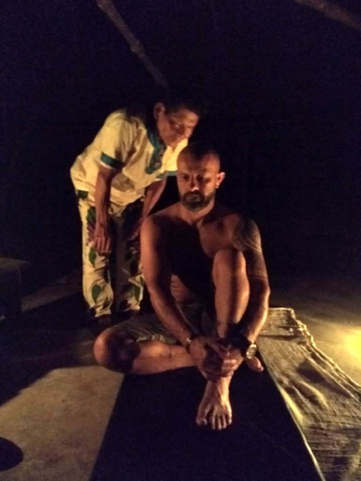Intimate Amazonian ceremonial setting at night, reflecting guidance, presence, and sacred listening in ayahuasca work.