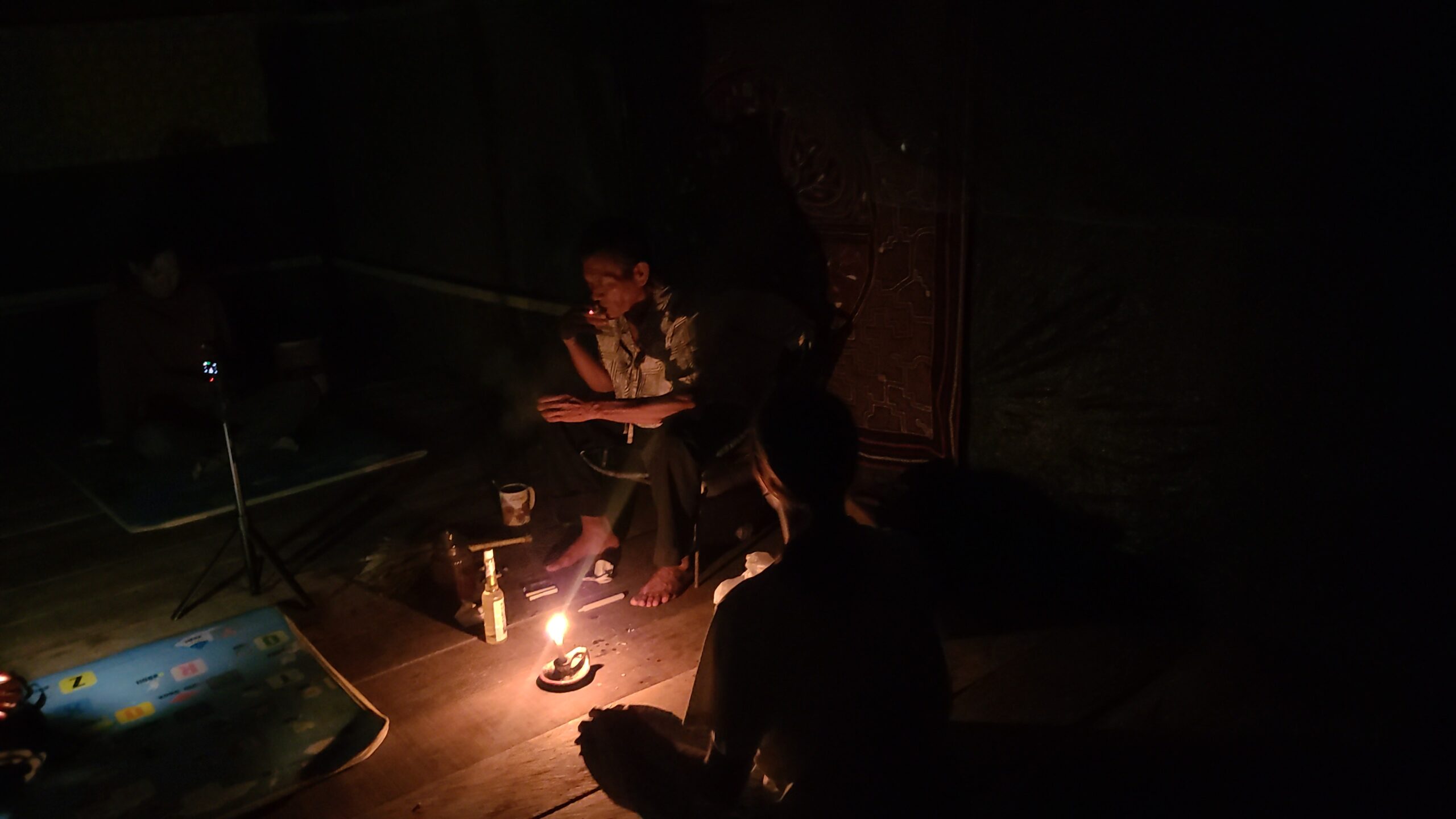 Nighttime ceremonial setting in the Amazon jungle