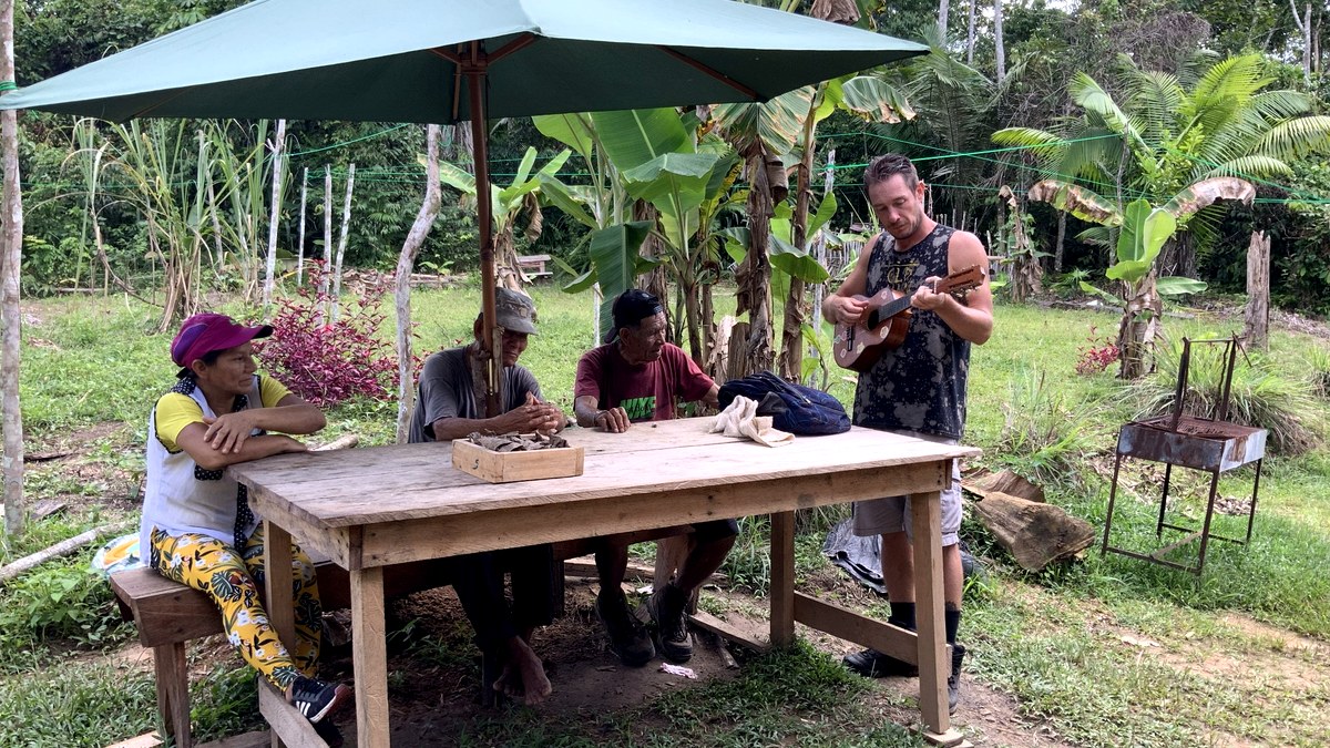 Ayahuasca preparation guide and Ayaymama Mystic retreat guests in the Amazon jungle near Iquitos Peru